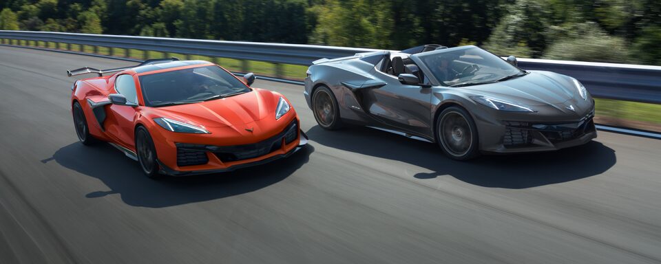 Front three-quarters view of Orange and Red 2025 Corvette Z06 on Track