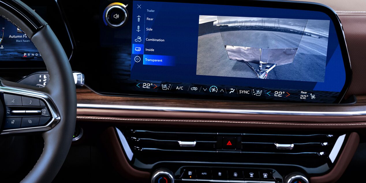 Close-up of the 2025 Chevrolet Suburban Infotainment System Displaying the Rear End Camera While Towing