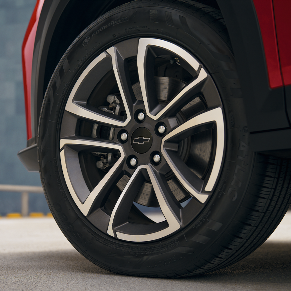 Close up of a Glazed Red 2026 Chevrolet Groove wheel