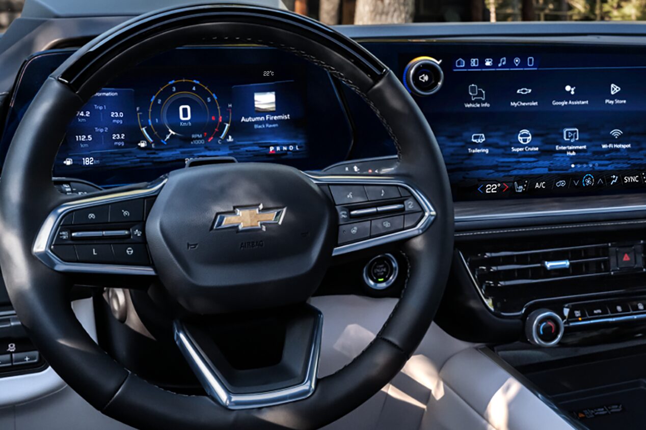 Driver's Seat View of the 2025 Chevrolet Tahoe SUV's Steering Wheel and Infotainment System