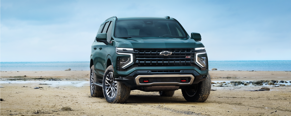 Front Three-Quarters View of the 2025 Chevrolet Tahoe SUV Parked on the Sand