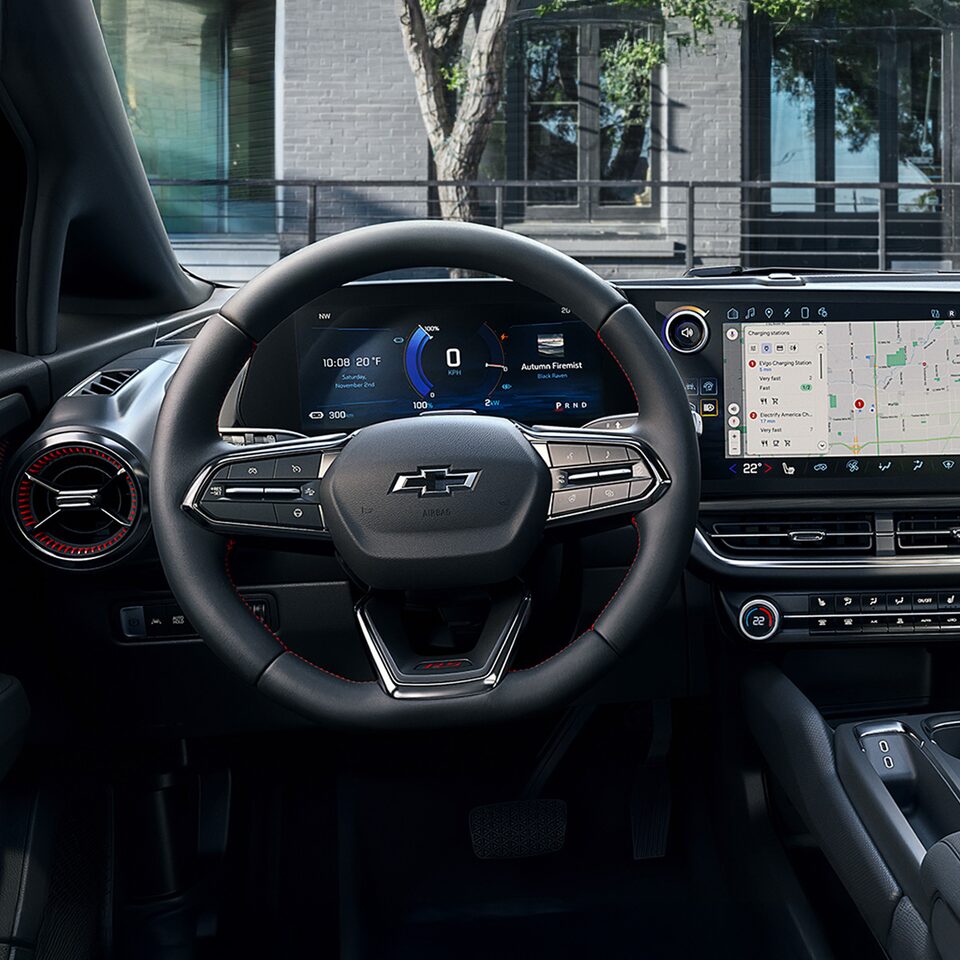 Driver’s Seat View of the Steering Wheel and Display Monitor of 2025 Chevy Equinox EV