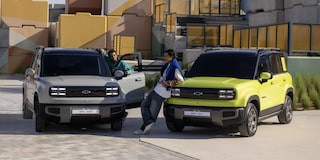 2 Chevrolet Spark EUVs parked