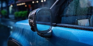 Driver side mirror of the Chevrolet Spark  EUV in  Sea Blue with Polar White Roof