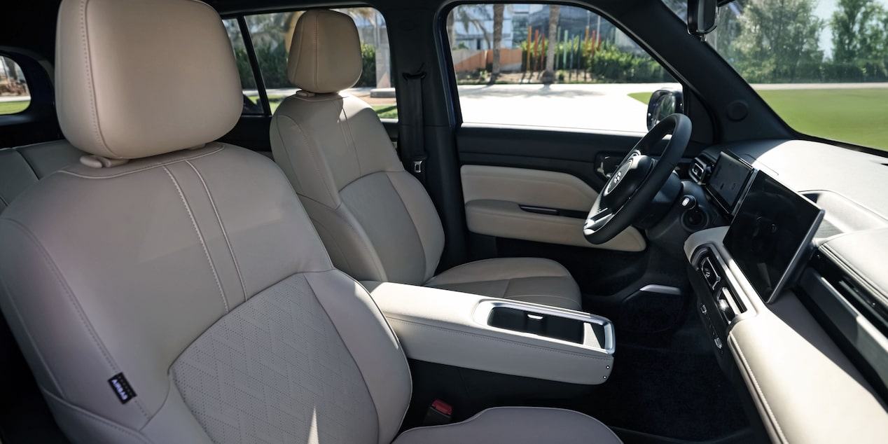 Front interior of the Chevrolet Spark EUV with beige leatherette.