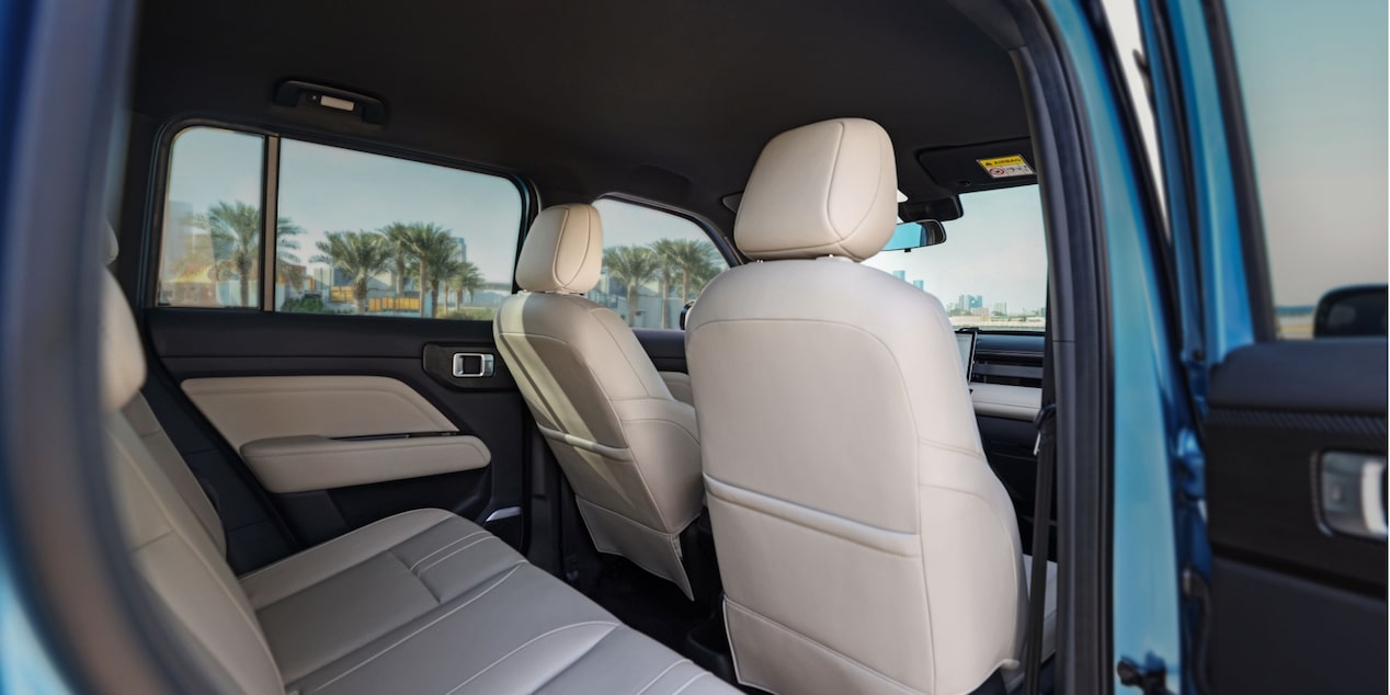 Rear interior of the Chevrolet Spark EUV with beige leatherette.