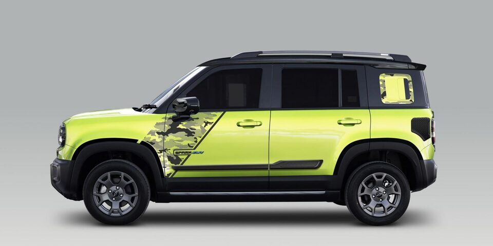 Driver side of the Chavrolet Spark EUV personalized with camo theme decals