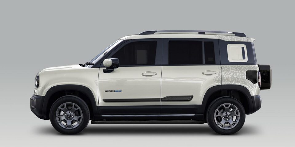 Driver side of the Chavrolet Spark EUV personalized with adventure theme decals