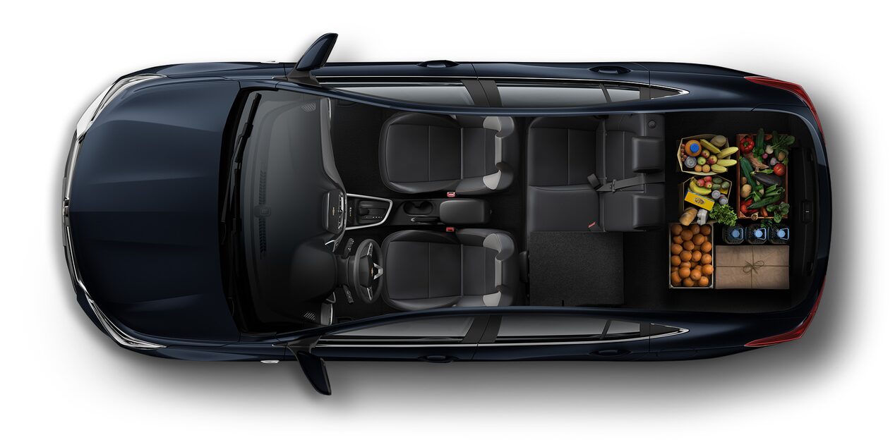 Espacio interior para ir de compras en Chevrolet Onix 2026, sedán deportivo