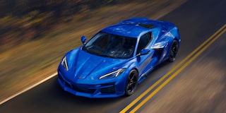 Overhead View of a Blue Chevy Corvette E-Ray Driving Down the Road