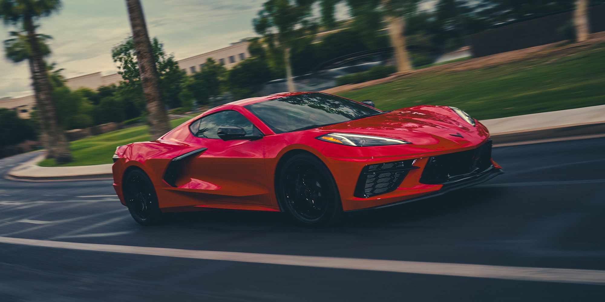 2026 Chevy Corvette Stingray Speeding Around a Bend in the Road
