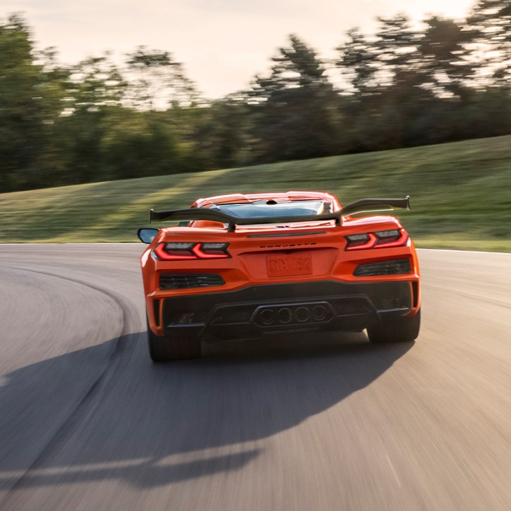2026 Chevy Corvette Z06 Driving Around a Bend on a Race Track