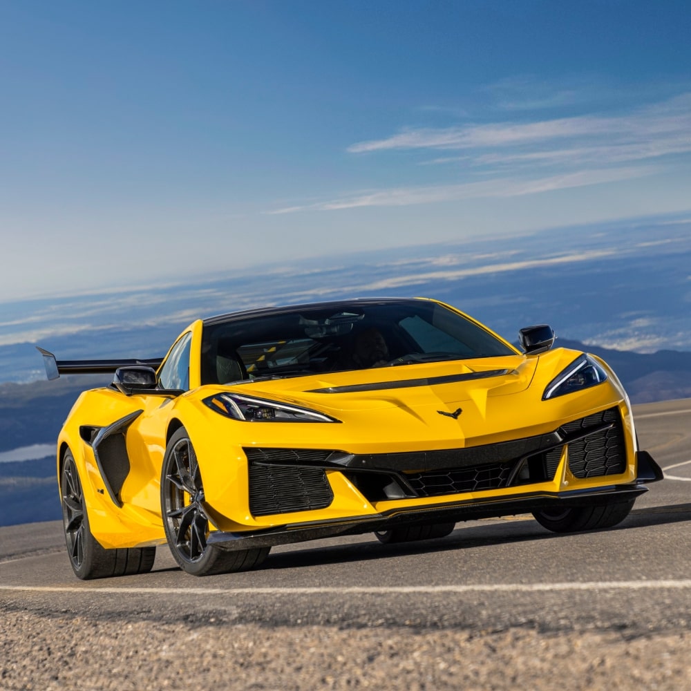 2026 Chevy Corvette ZR1 Driving Up a Curving Hill Road