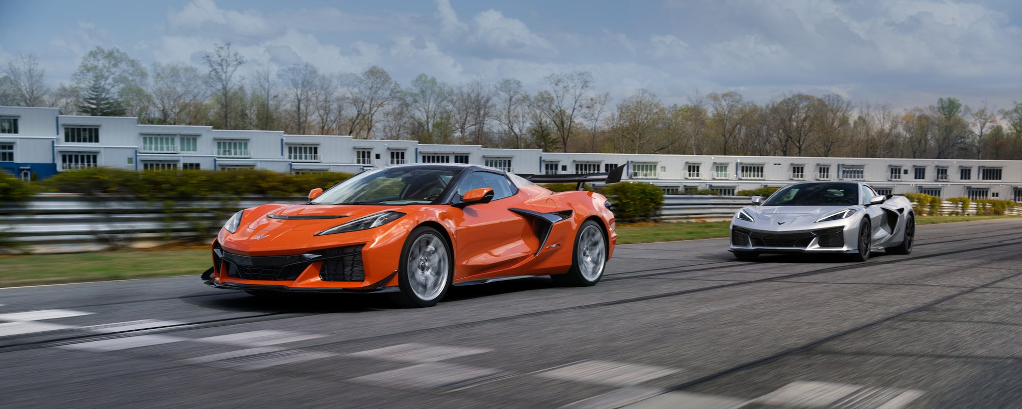 Two 2026 Chevy Corvette ZR1Xs Driving on a Racetrack