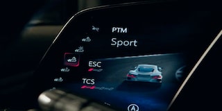 A Close‑Up of the Digital Display Inside a Chevrolet Corvette Grand Sport Shows Performance Traction Management Controls With Sport Mode Highlighted.