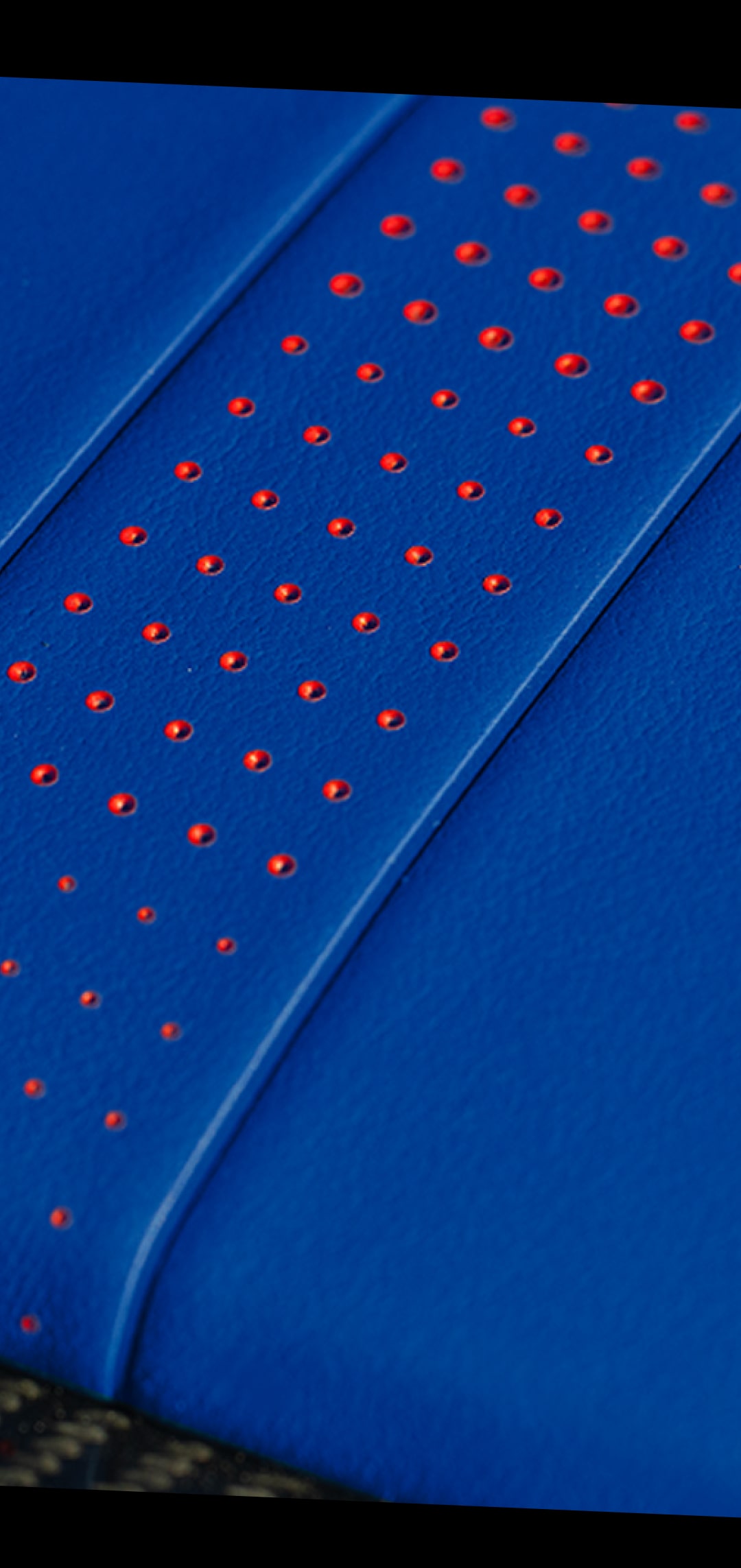 Grand Sport Launch Edition interior featuring Santorini Blue Dipped interior with Torch Red accents