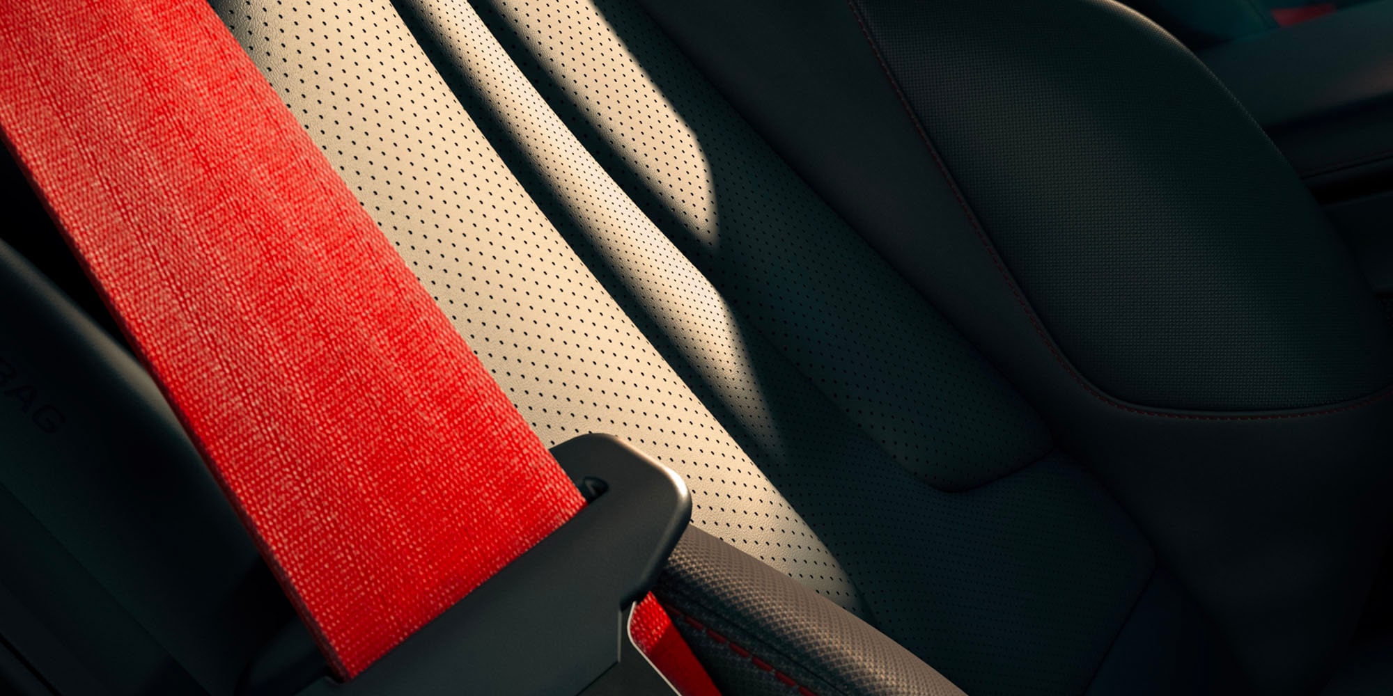Primer plano del material de los asientos y el cinturón de seguridad rojo de Chevy Corvette 2027