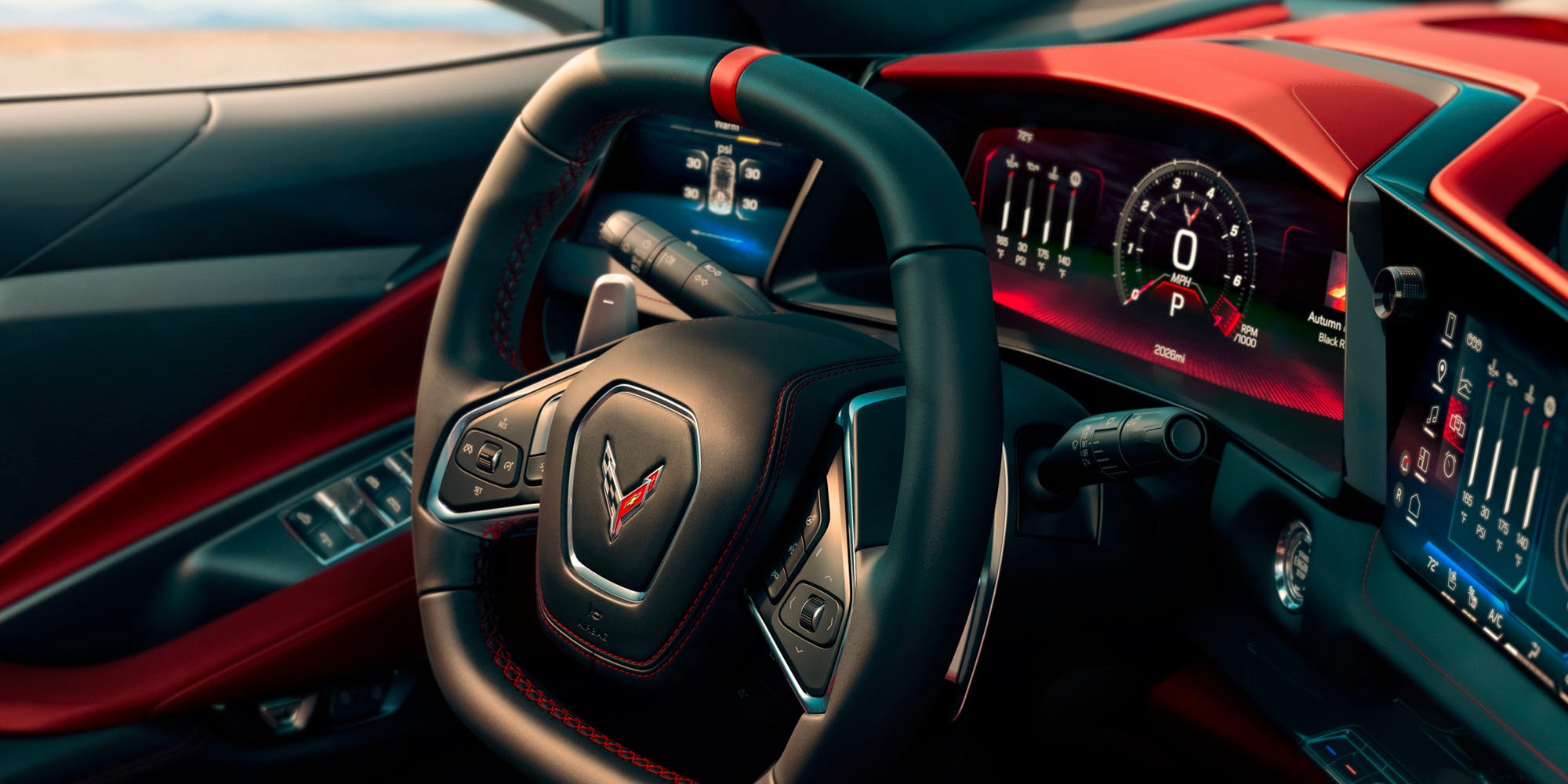 Close-up of the 2027 Chevy Corvette Stingray Flat-bottom Steering Wheel and Driver Digital Dashboard