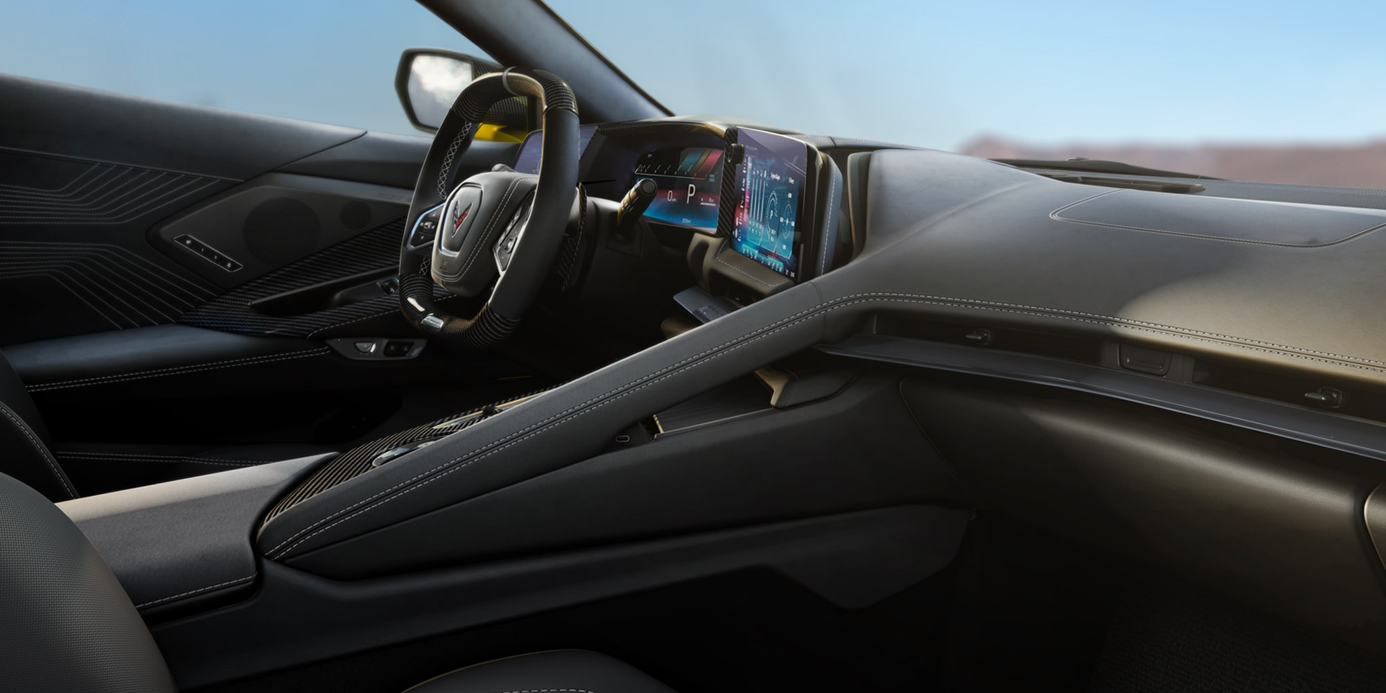 Interior de Chevy Corvette Z06 2027 en Gamuza Definitivo en Negro Azabache con Gris Cielo Vanguardista estándar