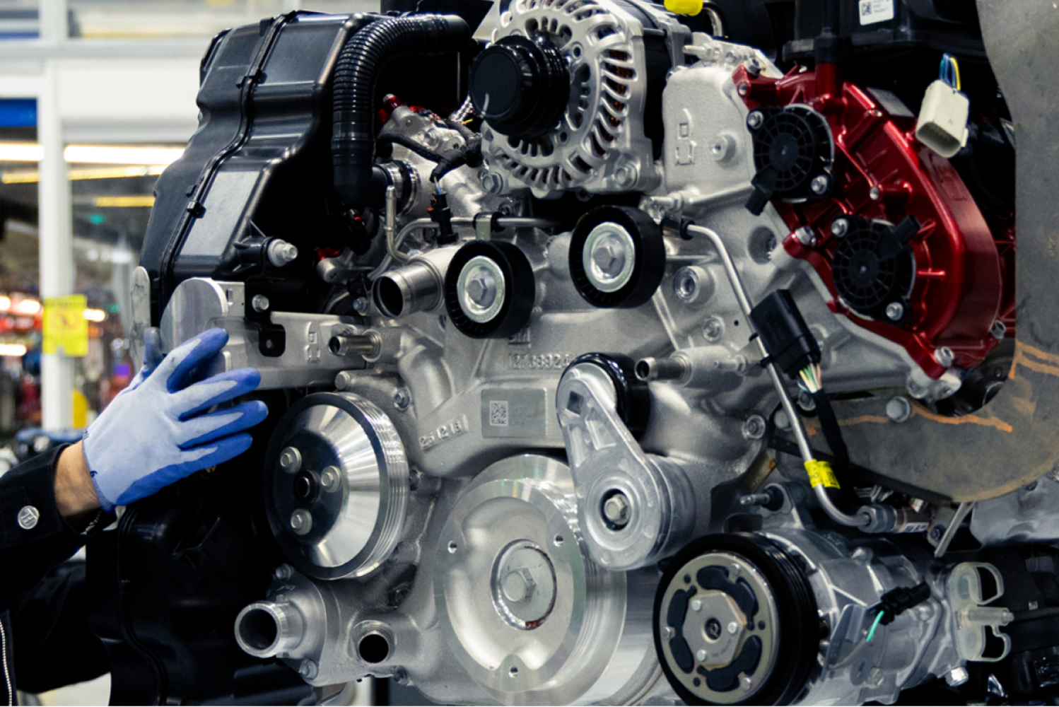 A Gloved Worker Assembles an engine for the 2027 Chevrolet Corvette Z06.