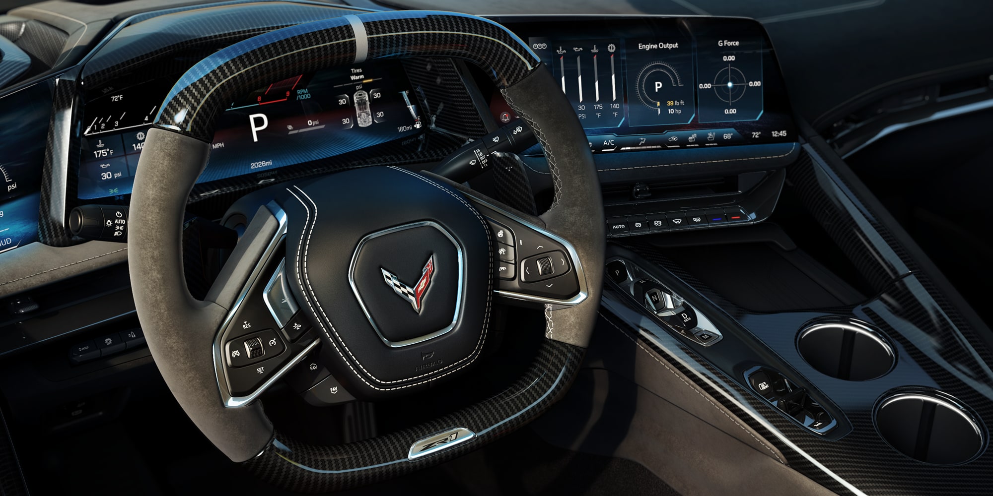 A Close‑Up View of the Center Console in a Chevrolet Corvette Grand Sport Shows Metallic Switch Controls Beside Two Circular Cupholders Set in Red Interior Trim.