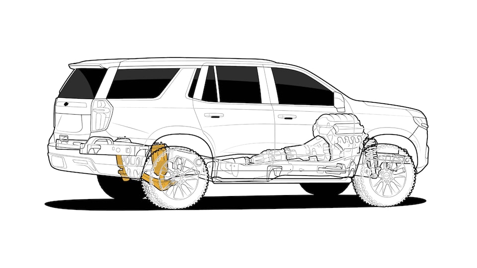 A black and white illustration of a 2021 Tahoe with an “x-ray” view of the frame, drivetrain, and suspension. The component featured in the text is colored gold.
