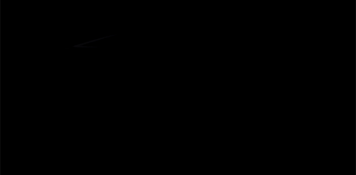 A gif of a side view of a black Camaro against a black background, with a light slowing illuminating it from above, from back to front.