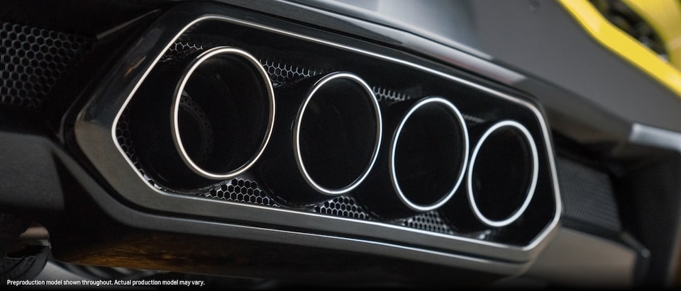 A close-up of the quad exhaust pipes on a Corvette Z06.