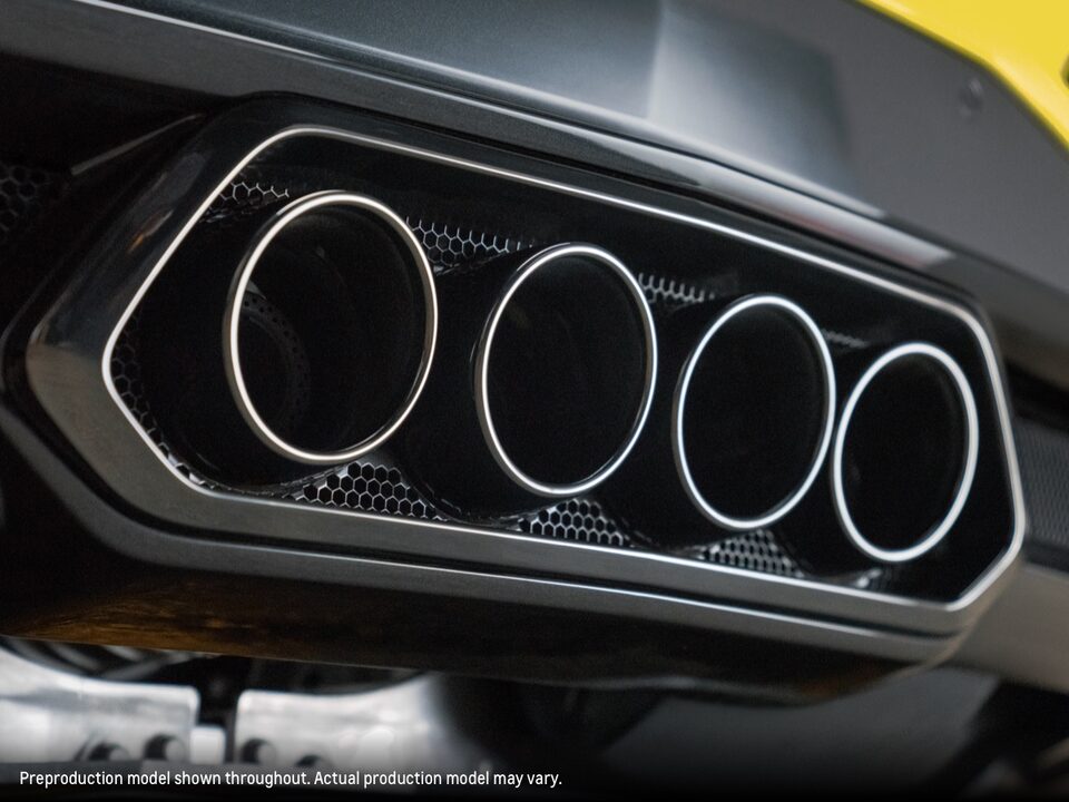 A close-up of the quad exhaust pipes on a Corvette Z06.