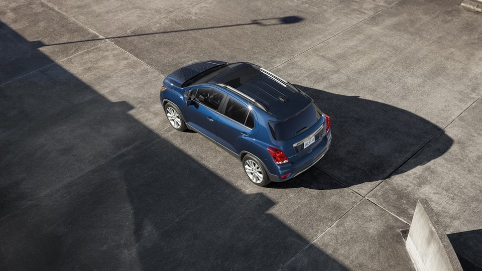 A Trax parked in a parking lot, seen from overhead.