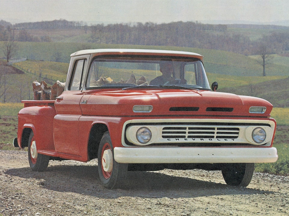 An old photograph of a red Chevy C/K Series pickup from the 1962 C/K brochure.