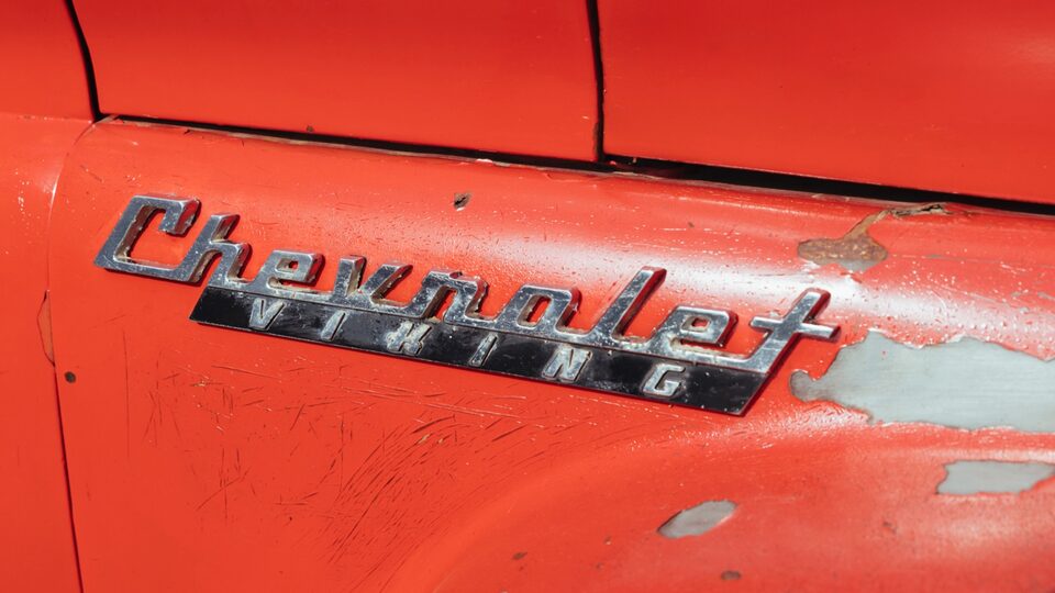 A closeup of the Chevrolet Viking badge on Patrick Carl’s vintage red Chevy pickup.