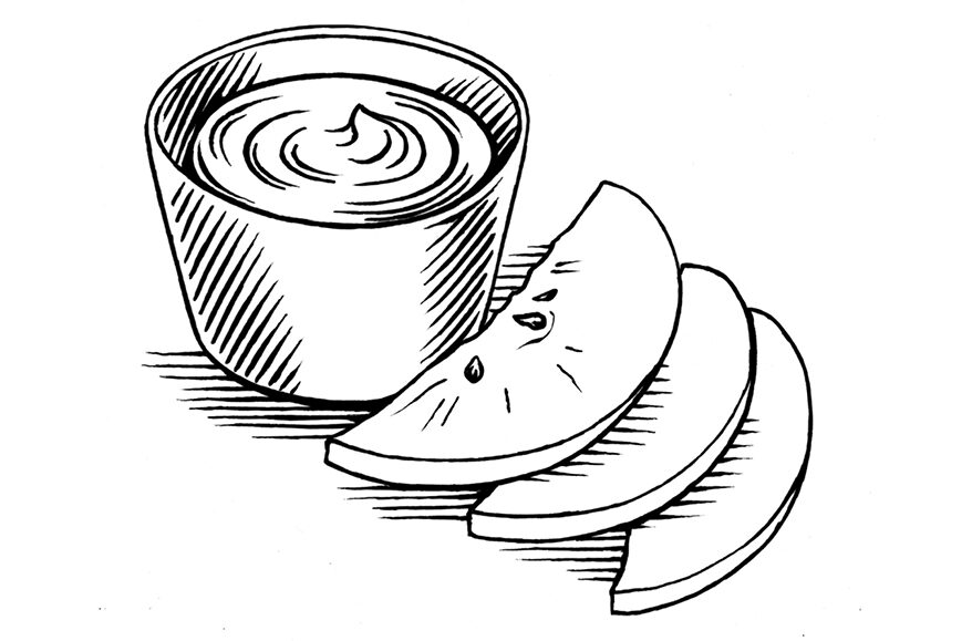 Black-and-white illustration of apple slices and a cupful of caramel.