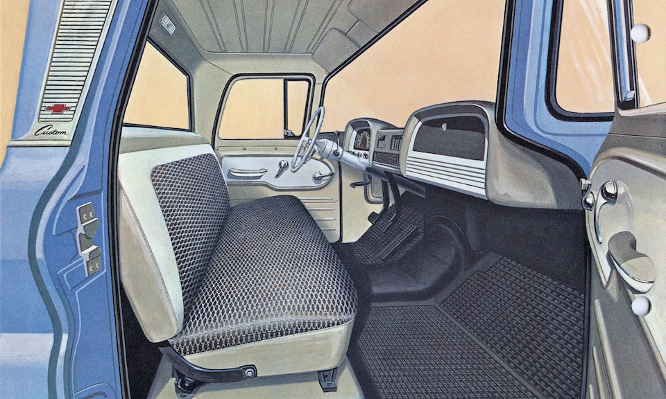 An illustration from the 1962 C/K Series truck brochure showing the interior of the truck’s cab.