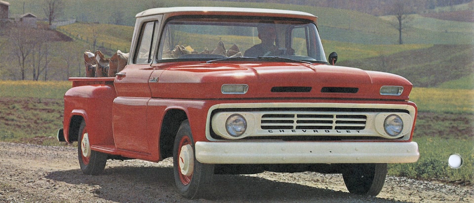 An old photograph of a red Chevy C/K Series pickup from the 1962 C/K brochure.
