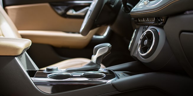 Interior details of the Blazer Premier in jet black with maple sugar leather appointments.