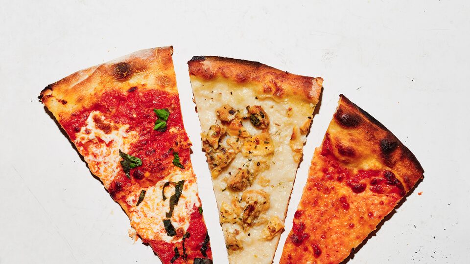 Three slices of pizza arranged on a white background with different toppings on each slice.