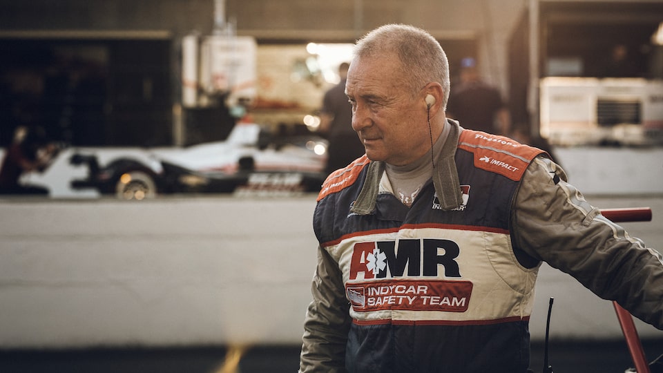 Tim Baughman wears a safety suit that reads “AMR INDYCAR Safety Team.” There is a race car and other equipment in the background.HEADERFILE NAMETHUMBNAILASSET# /STATUSIMAGE TYPEALT TEXTcupcakehero-masthead-21x9.gifMastheadAn animation that starts with a photo of Nadine Levin standing in front of a colorful background mural, which disappears piece by piece until we see Nadine standing with her custom Chevy Express van decorated with Pipe Dream Cup-cake graphics.