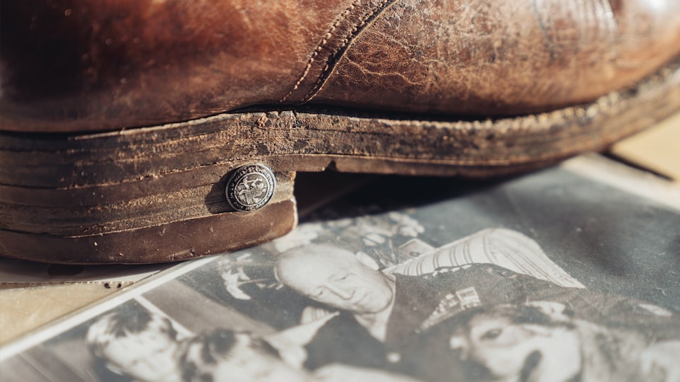Gen. George Patton's boot and an old photo of George Patton Waters as a child with Gen. Patton.