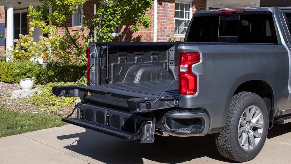 The Silverado Multi-Flex tailgate folded down to create a step.