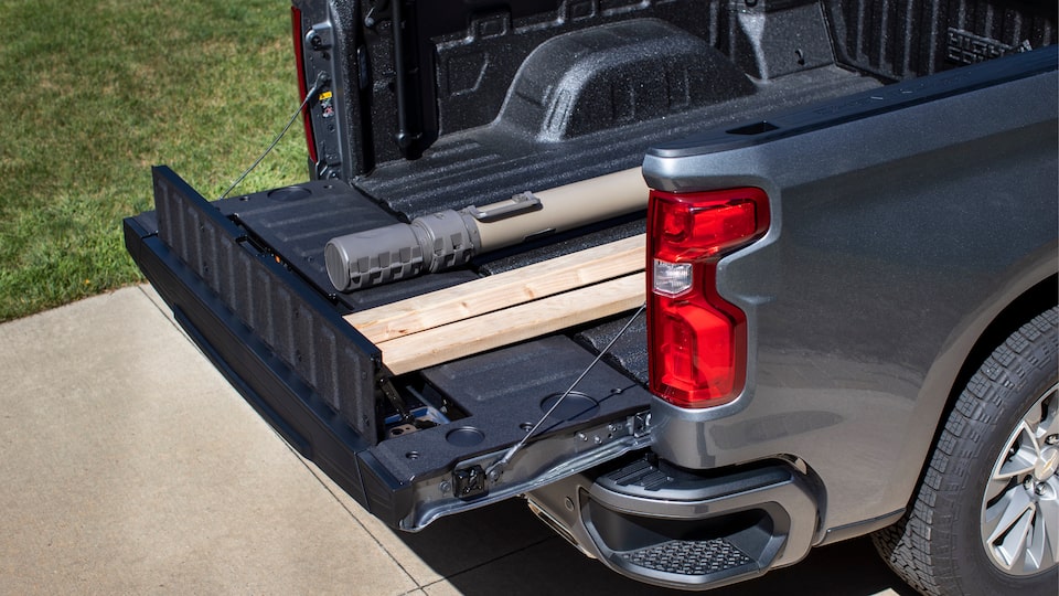 The Silverado Multi-Flex tailgate configured with the primary gate folded down and the load stop panel raised.