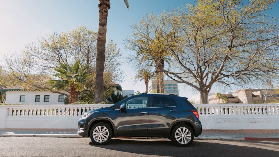 Chevrolet Trax parked on a neighborhood street.