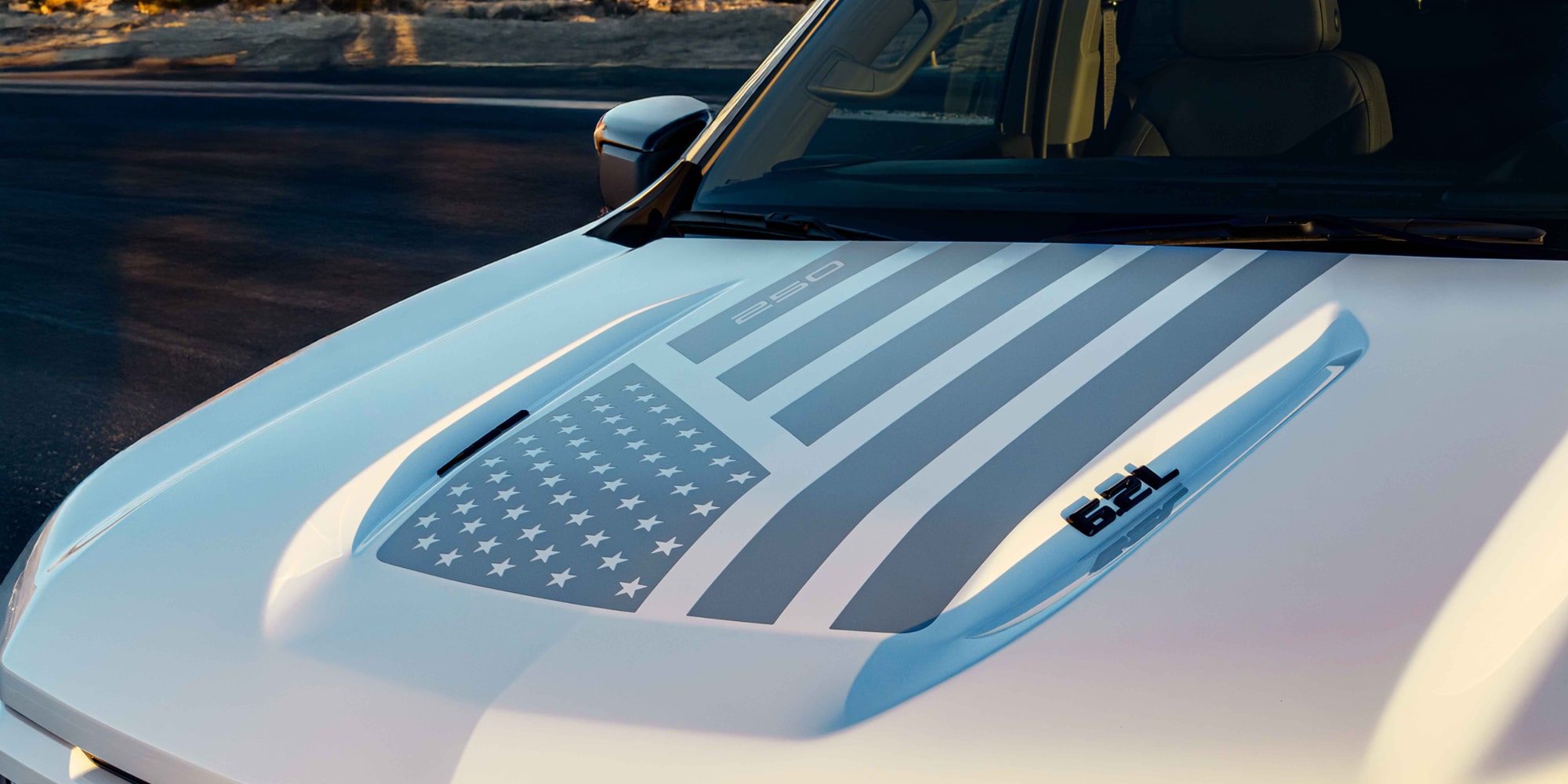 A Close-Up of the Chevrolet Silverado LD Hood, Displaying the Gray American Flag Decal of the Collection.