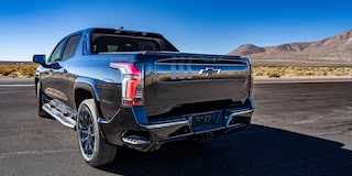 A Rear Three-Quarter View of the Black Chevrolet Silverado EV, Showcasing its Modern Tailgate Design.