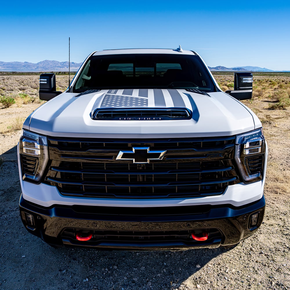 A Front View of a White Chevy Truck.