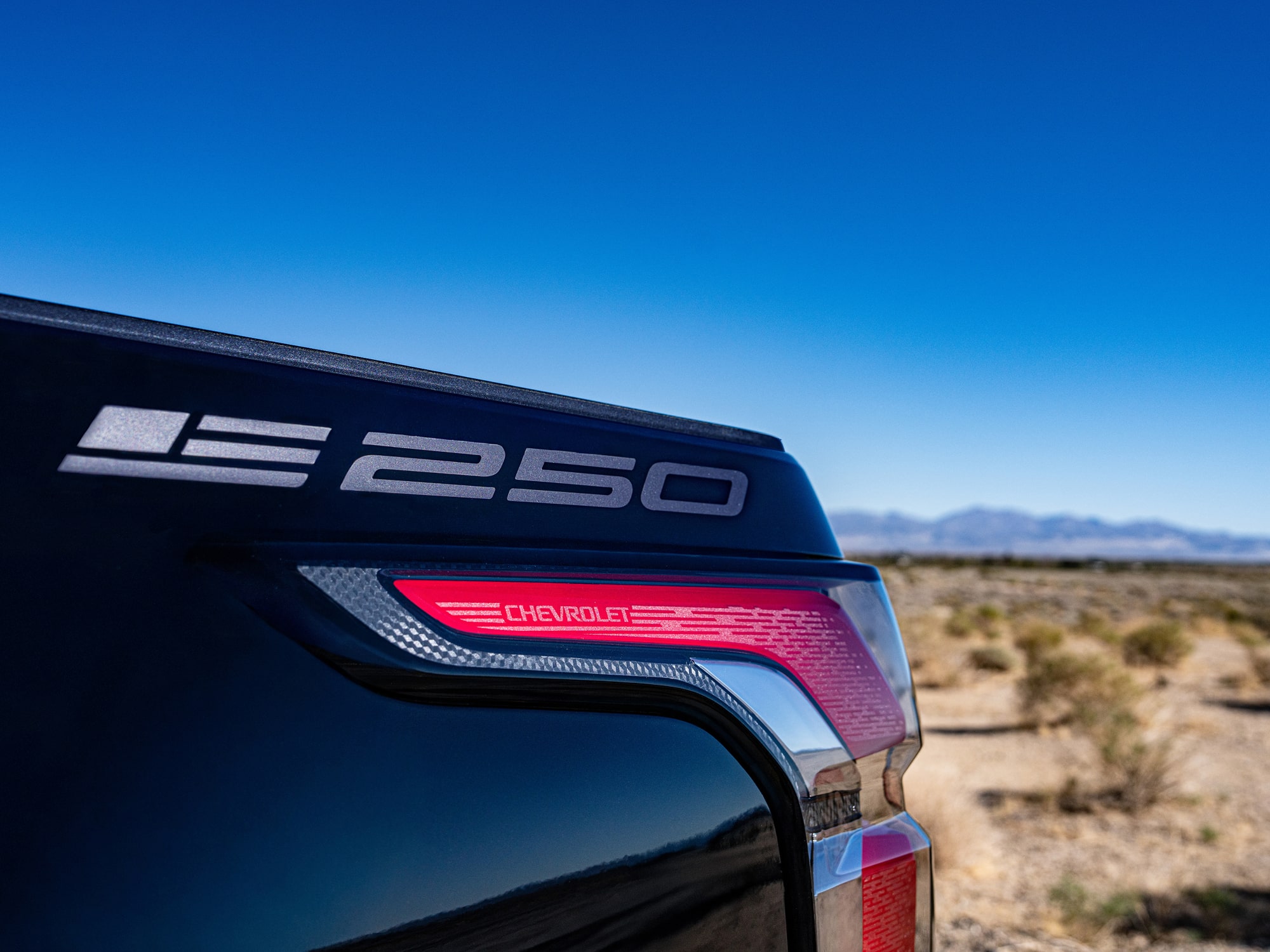 A Detailed Shot of the Chevrolet Silverado EV Stars and Steel Edition, Highlighting the 250 Anniversary Badge.