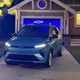 2027 Chevrolet Bolt in Marina Blue Metallic Parked in a Driveway