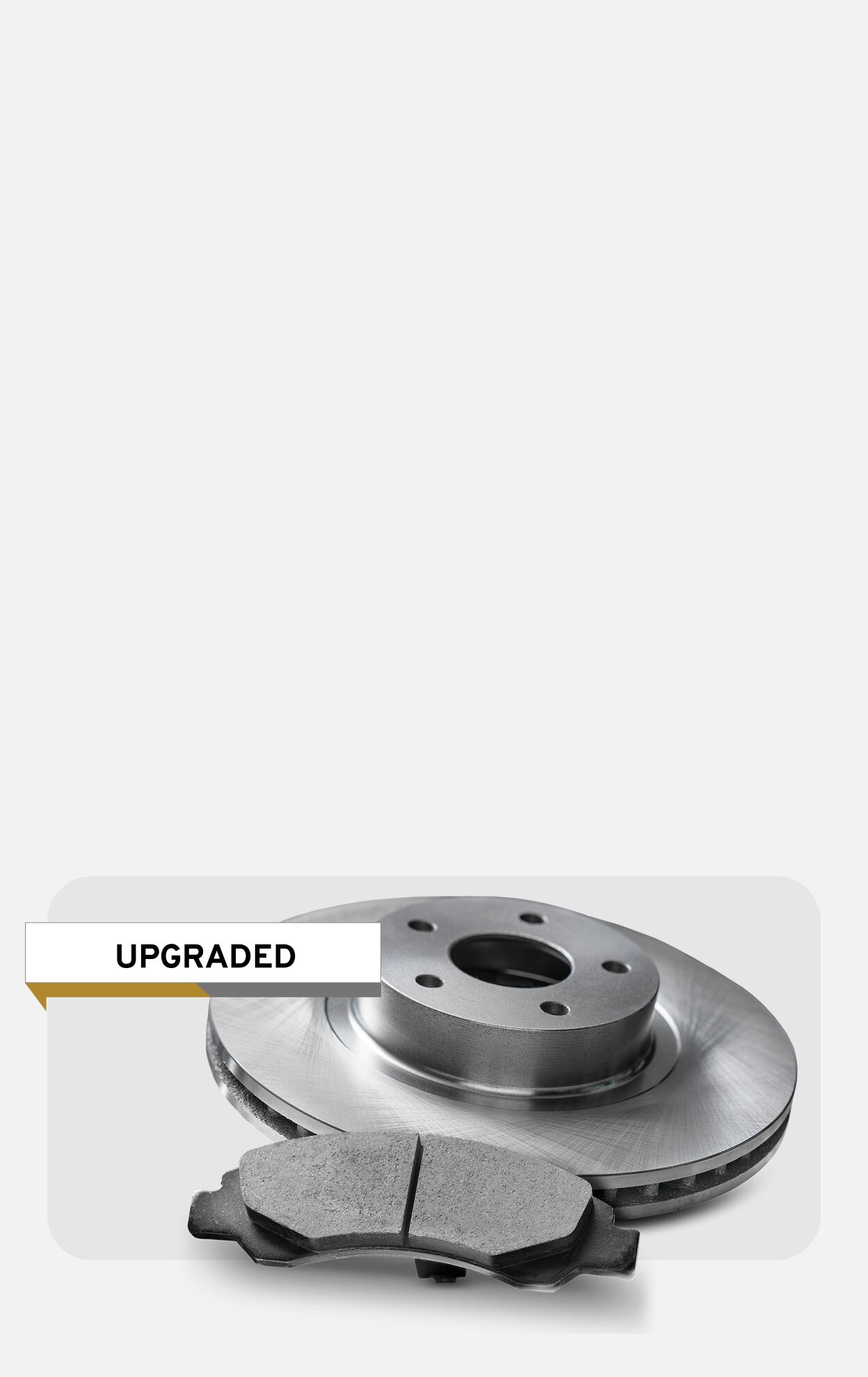 Brake Rotor and Brake Pad Components with an “UPGRADED” Label.