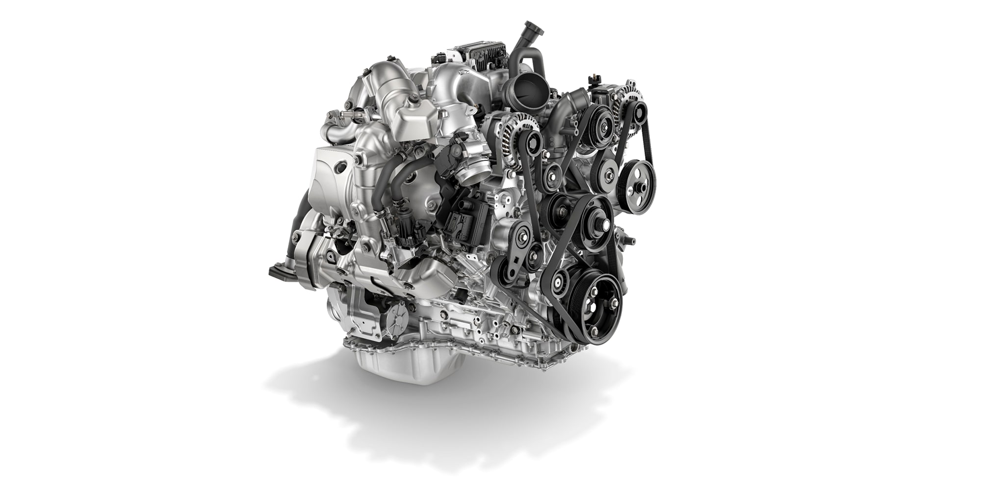 A Detailed View of a Modern Turbo-Diesel Engine, Highlighting its Turbocharger, Serpentine Belt System, and Engine Components.