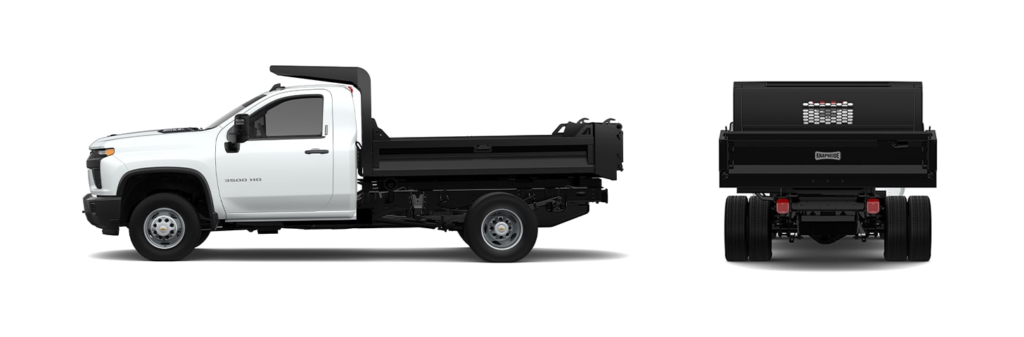 A White Chevrolet Silverado 3500 Chassis Cab Truck, Configured With a Black Flatbed and Head Rack, Viewed From the Side and Rear Angles.